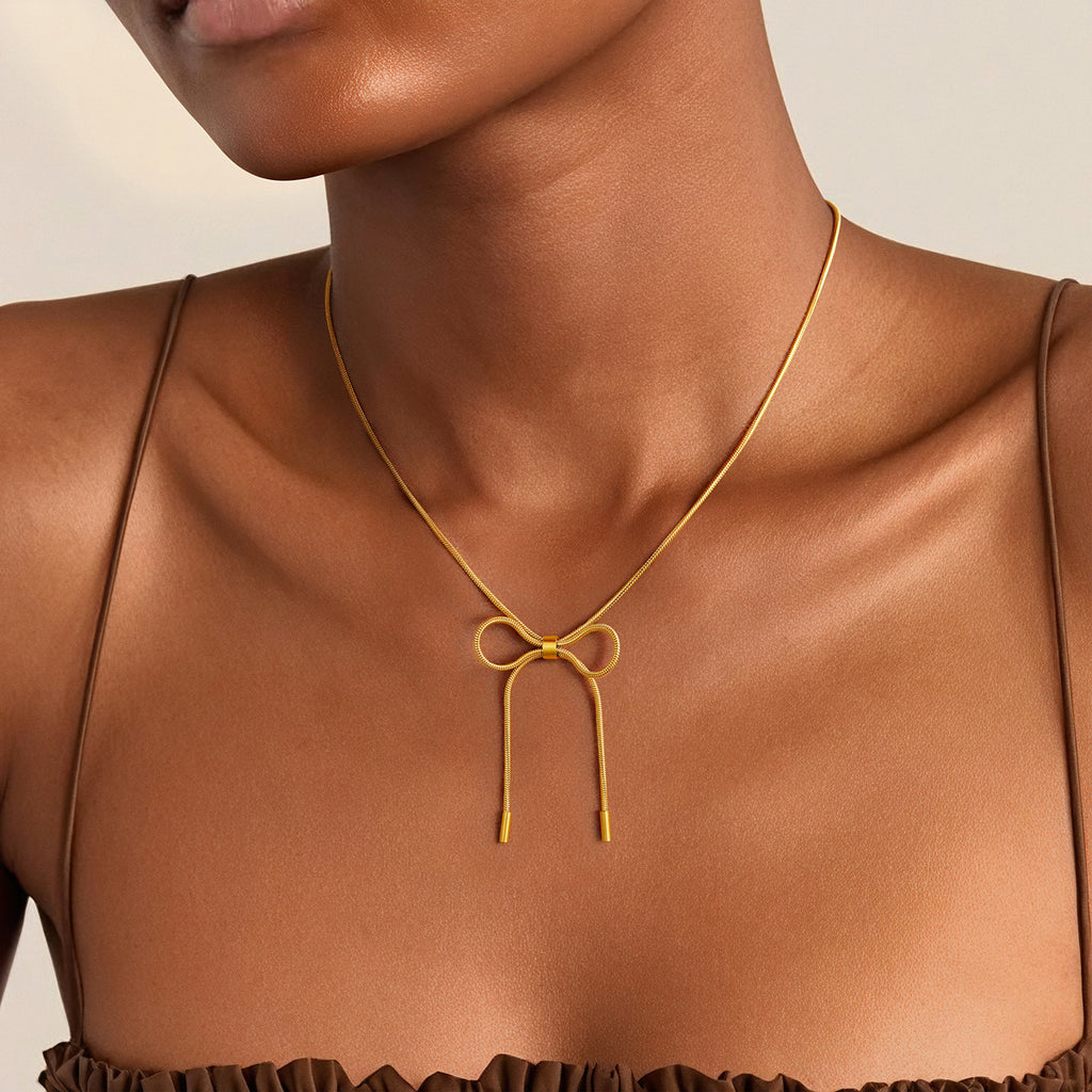 Elegant Bow Design Necklace with Inlaid Pearls for Women
