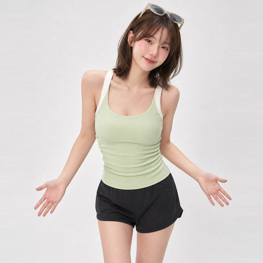 One-piece sports bra with chest pads for yoga enthusiasts