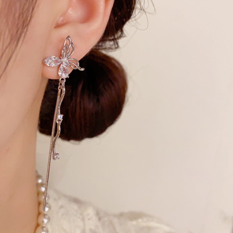 Luxurious Hollow Butterfly Long Tassel Earrings - Fashion Statement